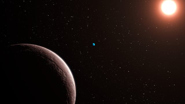 Der Exoplanet Gliese 581e im Umlauf um seinen Zentralstern