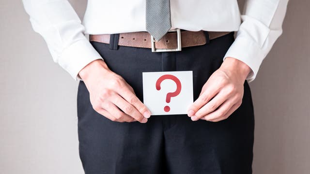 Mann mit Fragezeichen 