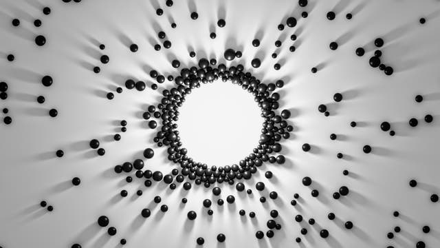 Magnetische Anziehung zwischen schwarzen Kugeln auf weißem Grund, dreidimensional