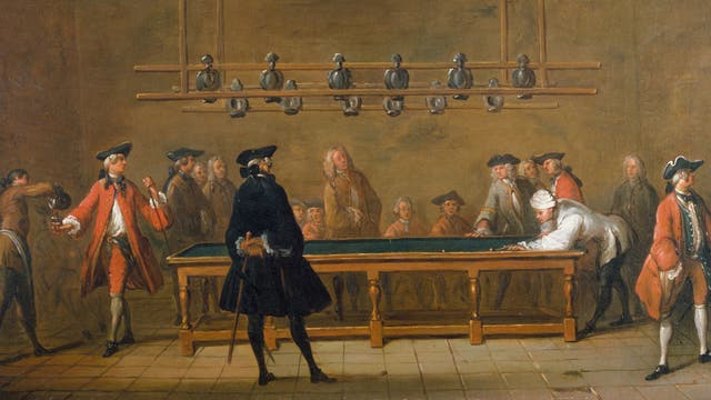 Eine historische Gemäldeszene zeigt eine Gruppe von Menschen in einem Raum mit Holzbalkendecke. Im Vordergrund stehen zwei Männer in historischer Kleidung, einer in Rot und der andere in Schwarz. Im Hintergrund sind weitere Personen um einen Billardtisch versammelt, einige sitzen, andere stehen. An der Decke hängt eine Reihe von Kerzenhaltern. Die Szene vermittelt den Eindruck einer geselligen Zusammenkunft oder eines Treffens aus einer vergangenen Epoche.