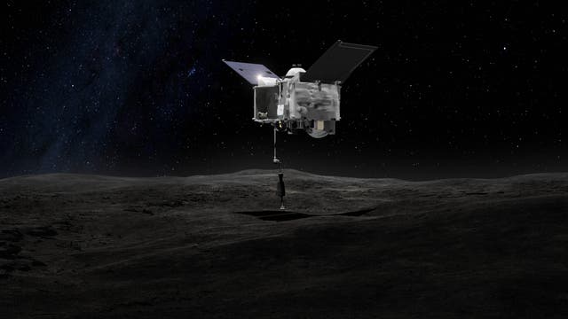 Künstlerische Darstellung: Die Raumsonde OSIRIS-REx entnimmt dem Asteroid Bennu eine Gesteinsprobe.