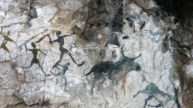 Höhlenmalerei mit Jägern und Tieren