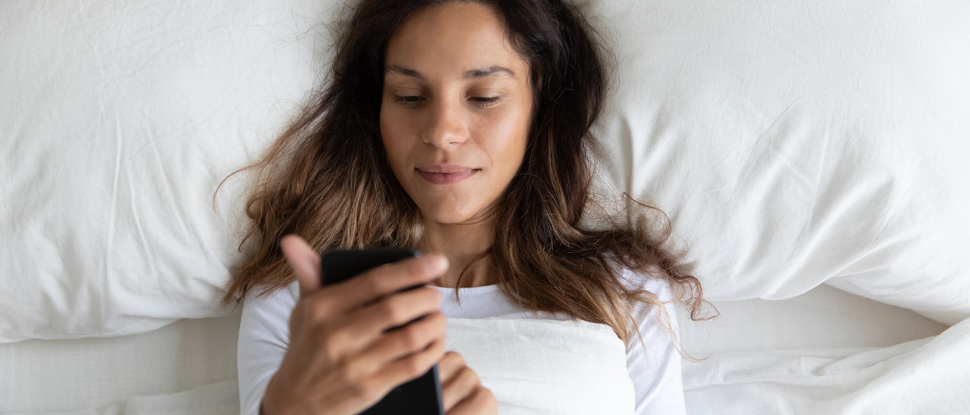 Der morgendliche Griff zur Fruchtbarkeits-App Der morgendliche Griff zur Fruchtbarkeits-App