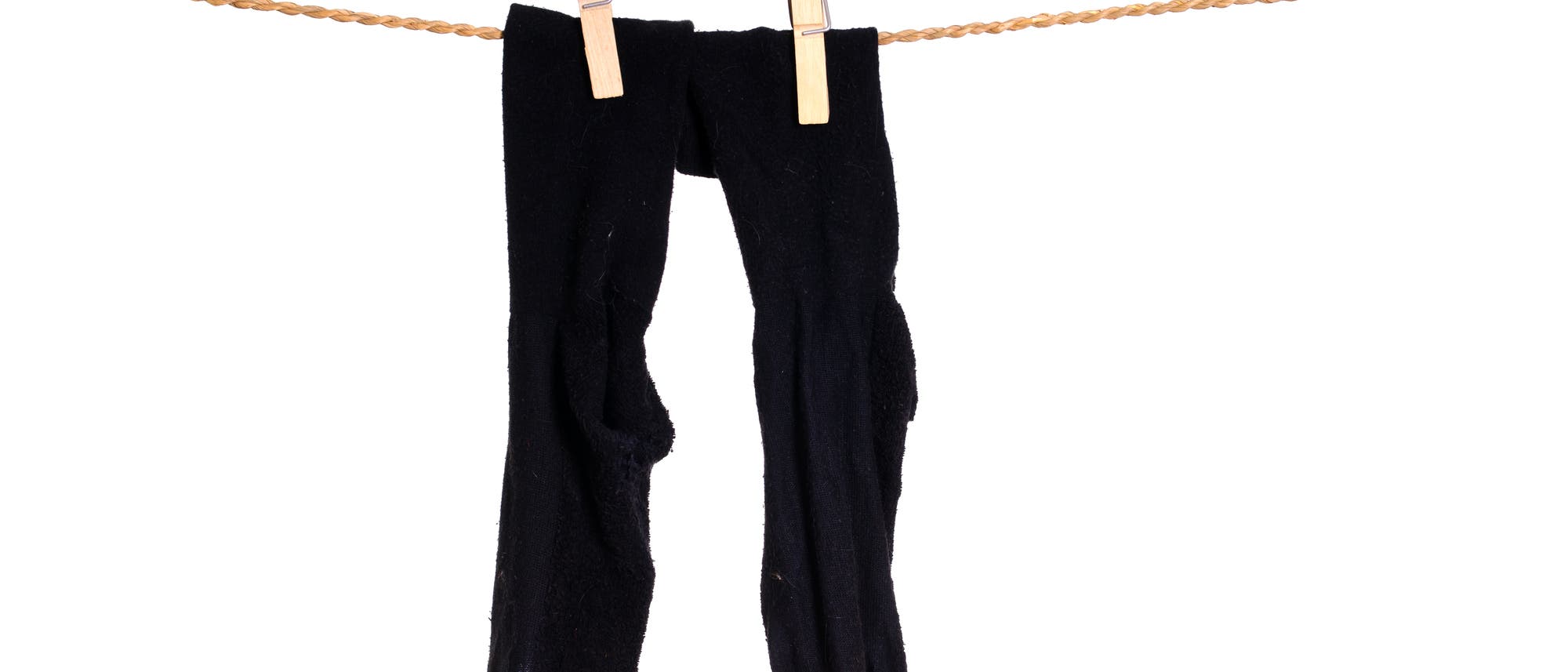 Nasse Socken auf der Wäscheleine Nasse Socken auf der Wäscheleine