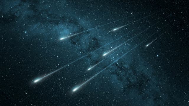Eine Illustration von mehreren Sternschnuppen/Boliden vor einem Sternenhimmel.