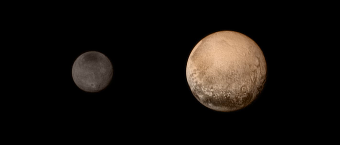 Pluto und Charon in Farbe Pluto und Charon in Farbe