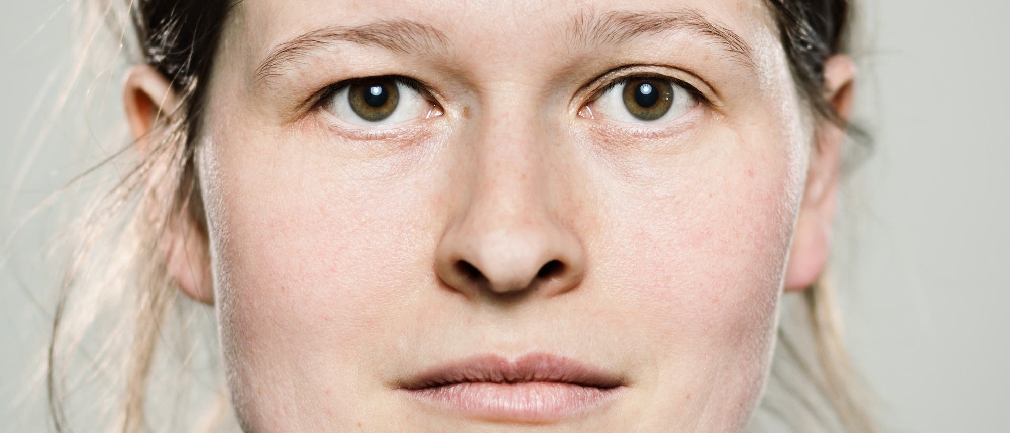 Der Kopf einer Frau von vorne. Der Kopf einer Frau von vorne.